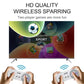 Two hands holding wireless gaming controllers in front of a TV screen displaying game icons.